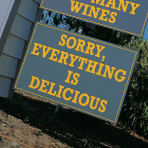 Sign saying "Sorry, Everything is Delicious" at Mustards Restaurant